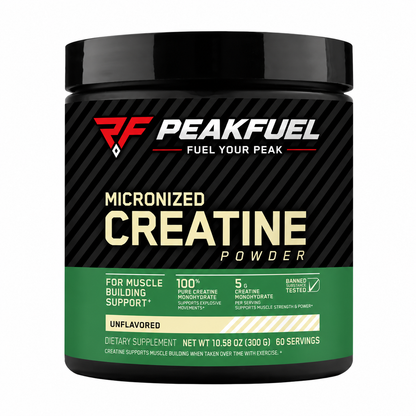 A black plastic tub of PeakFuel Micronized Creatine Powder with a black, white, and green label, shown on a plain white background.